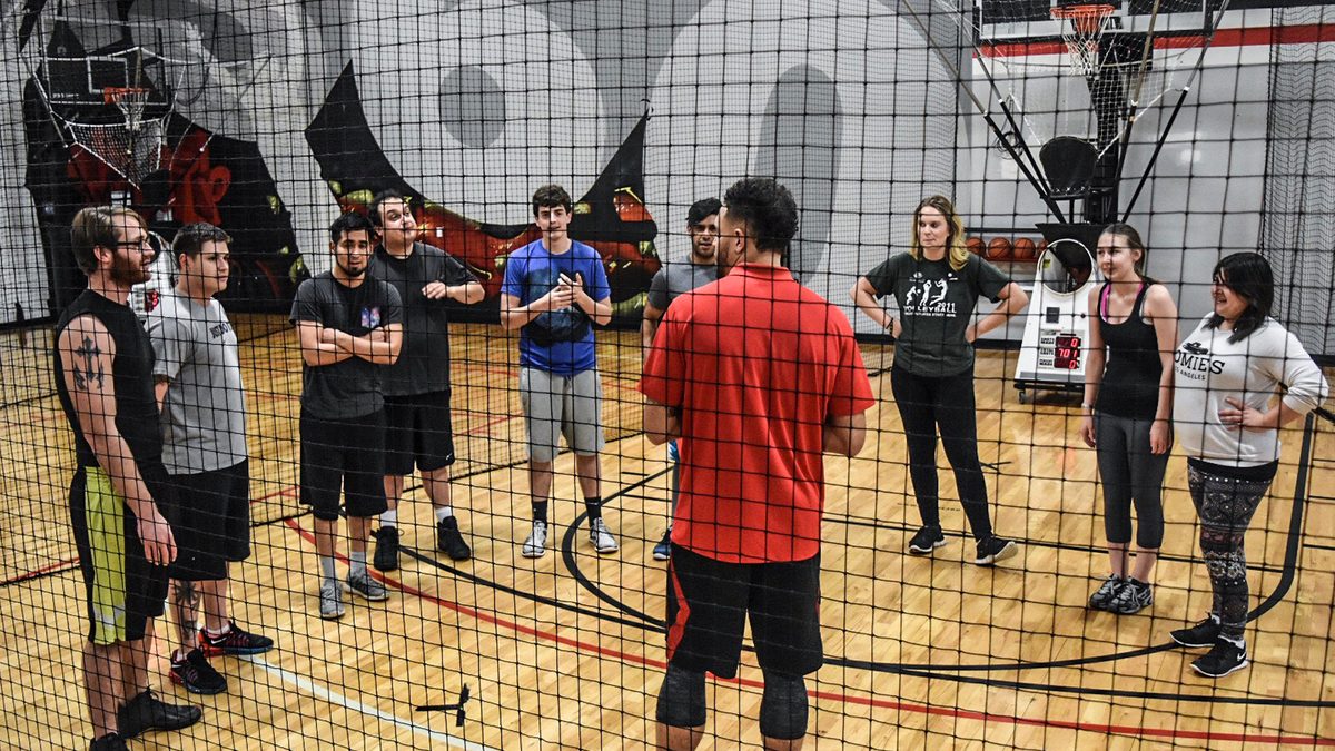Players competing on the skill courts